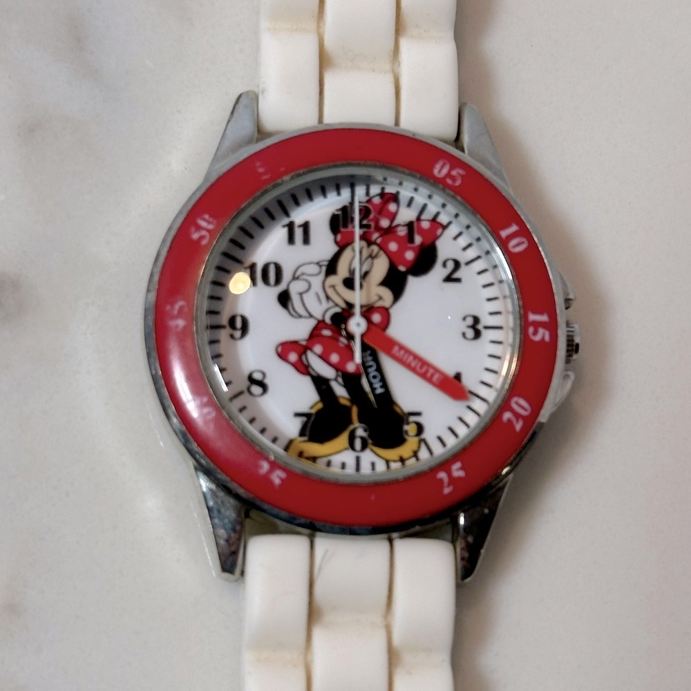 Minnie Mouse vintage wristwatch white rubber band and red & white watch face.